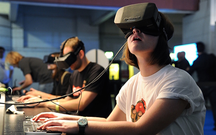 The Oculus Rift headset is tested by attendees at the Eurogamer Expo at Earls Court in London.