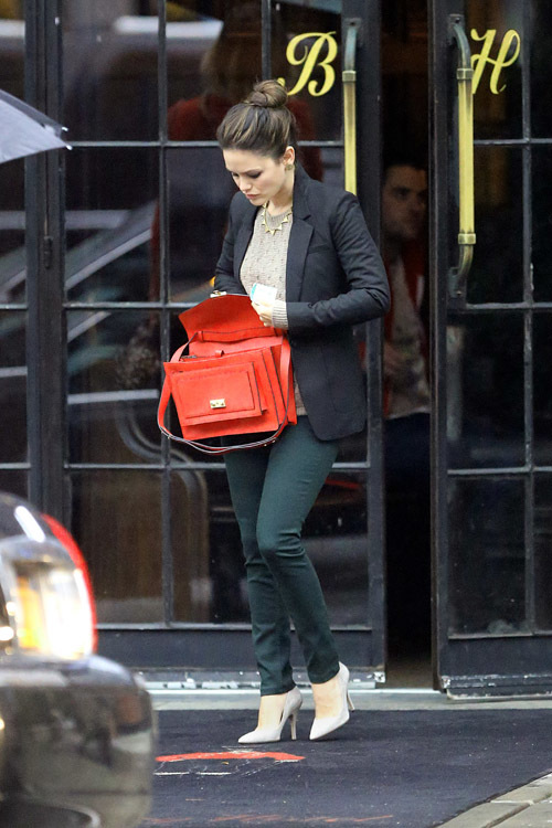 Rachel Bilson was spotted leaving her New York City hotel on a rainy day. Pictured: Rachel Bilson Ref: SPL443440  031012   Picture by: Sharpshooter Images /Splash Splash News and Pictures Los Angeles:	310-821-2666 New York:	212-619-2666 London:	870-934-2666 photodesk@splashnews.com 