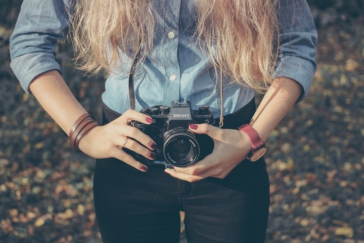person-woman-camera-taking-photo-large