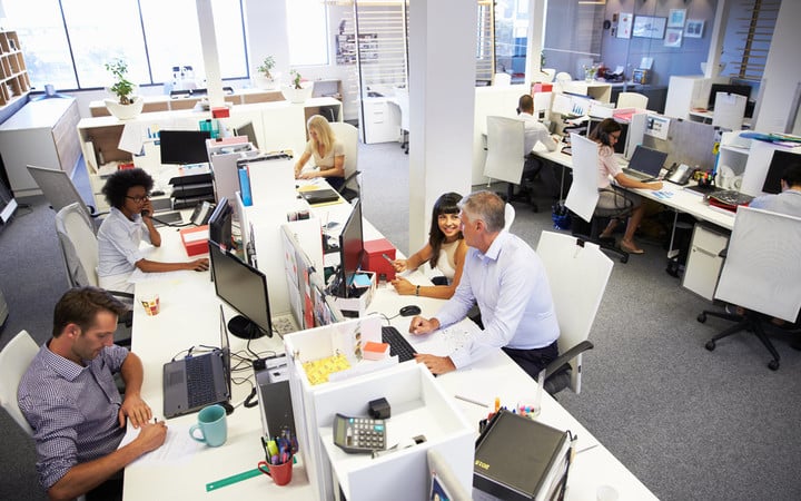 People working in a busy office