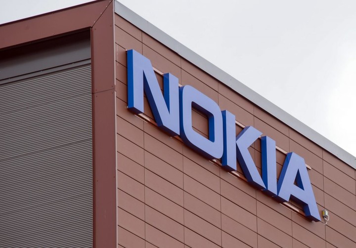 epa05246392 (FILE) A file photo dated 16 April 2015 showing Nokia logo on the wall of Nokia company headquarters in Espoo, Finland. According to reports from 06 April 2016, Nokia aims to save 900 million euro per year until 2018 by cutting up to 15,000 jobs. EPA/MARKKU OJALA FINLAND OUT *** Local Caption *** 52564872 ORG XMIT: NOK01