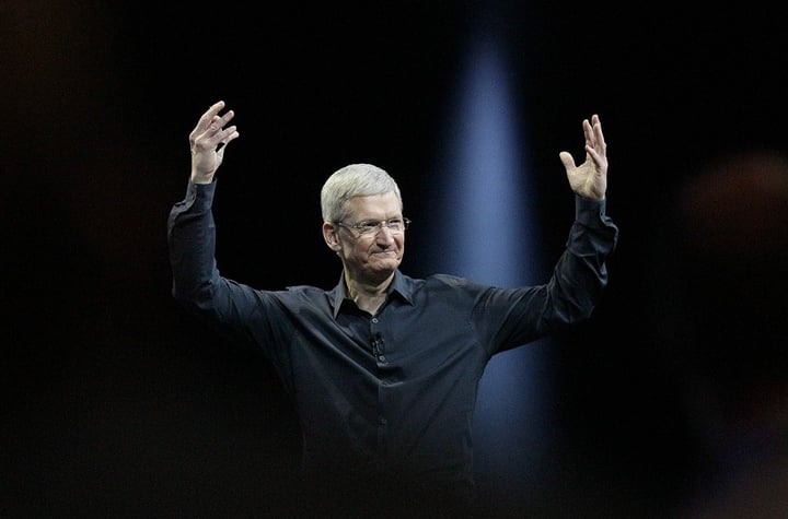 Apple CEO Tim Cook gestures while speaking at the Apple Worldwide Developers Conference in San Francisco, Monday, June 2, 2014. Apple's Mac operating system is getting a new design and better ways to exchange files, while new features in the software for iPhones and iPads include one for keeping tabs on your health. (AP Photo/Jeff Chiu)