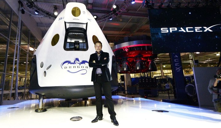 HAWTHORNE-CA-MAY 29: SpaceX CEO Elon Musk unveils the company's new manned spacecraft, The Dragon V2, designed to carry astronauts into space during a news conference on May 29, 2014, in Hawthorne, California. The private spaceflight company has been flying unmanned capsules to the Space Station delivering cargo for the past two years. The Dragon V2 manned spacecraft will ferry up to seven astronauts to low-Earth orbit. (Photo by Kevork Djansezian/Getty Images)