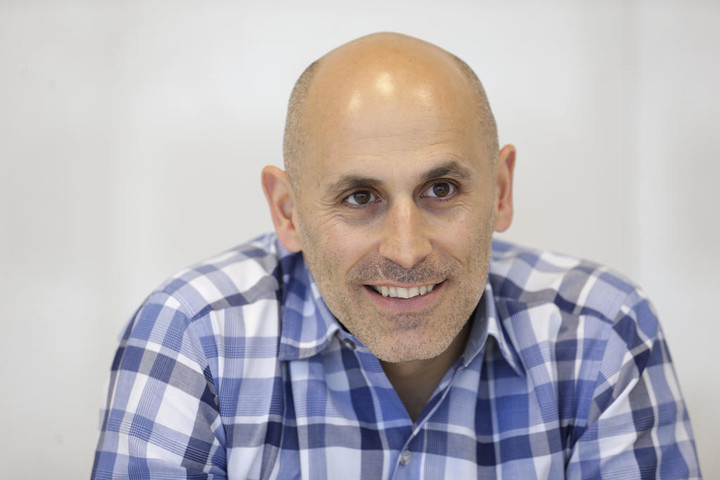 In this Monday, May 2, 2016, photo, Jet.com CEO Marc Lore speaks during an interview, in Hoboken, N.J. Lore aims to reinvent the shopping cart while taking on Amazon.com. The marketplace site, launched in July 2015 to a lot of scrutiny, now sells more than 11 million products ranging from jeans to diapers in its bid to underprice an industry Goliath and other stores. (AP Photo/Seth Wenig)