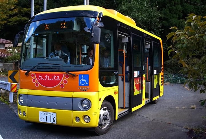 A bus in Yazu, Tottori, one of four towns partnering with SB Drive on autonomous driving tests. (Photographer: Yuki Saji via Bloomberg)