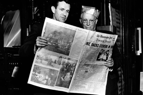 In this March 18, 1954 photo, Philip L. Graham, left, and Eugene Meyer look at the first The Washington Post Times Herald, in Washington. Amazon.com founder Jeff Bezos struck a deal Monday, Aug. 5, 2013 to buy The Washington Post and other newspapers for $250 million in a startling demonstration of how the Internet has created both winners and losers and utterly transformed the media landscape. (AP Photo/The Washington Post, Charles Del Vecchio) WASHINGTON TIMES OUT; NEW YORK TIMES OUT;THE WASHINGTON EXAMINER AND USA TODAY OUT; MAGS OUT; NO SALES
