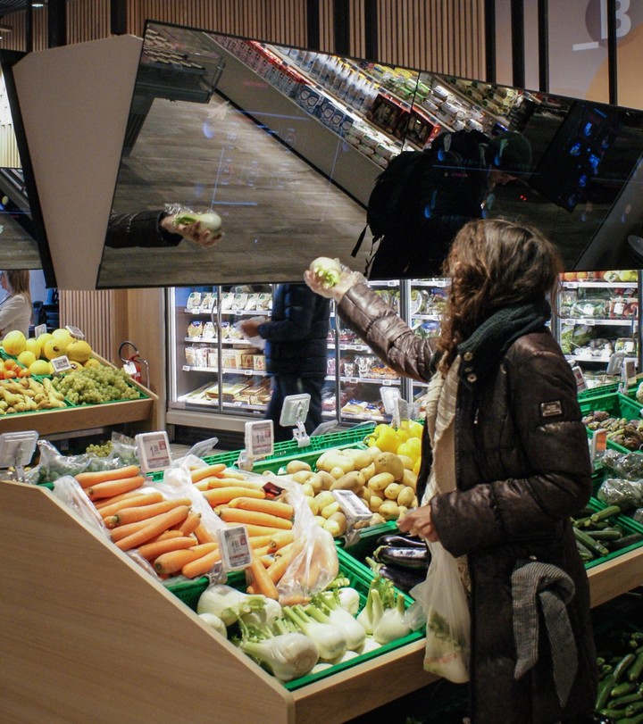 above-the-produce-there-are-long-reflective-screens